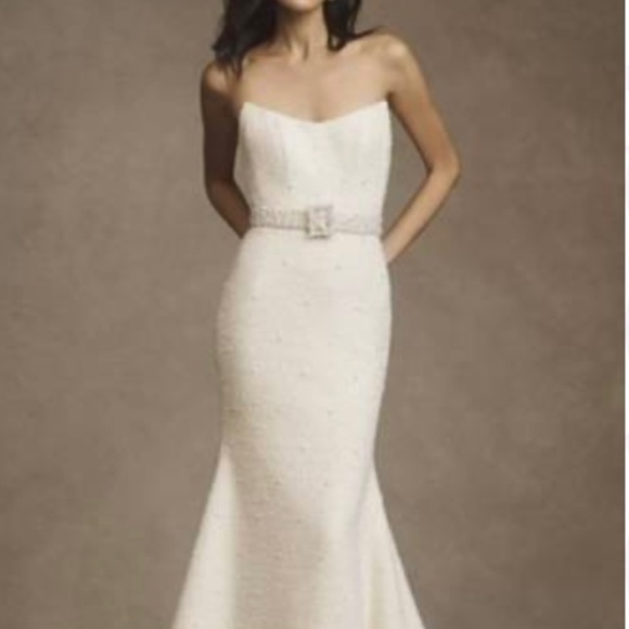 Two bridal gowns in excellent condition.Plus shoes.